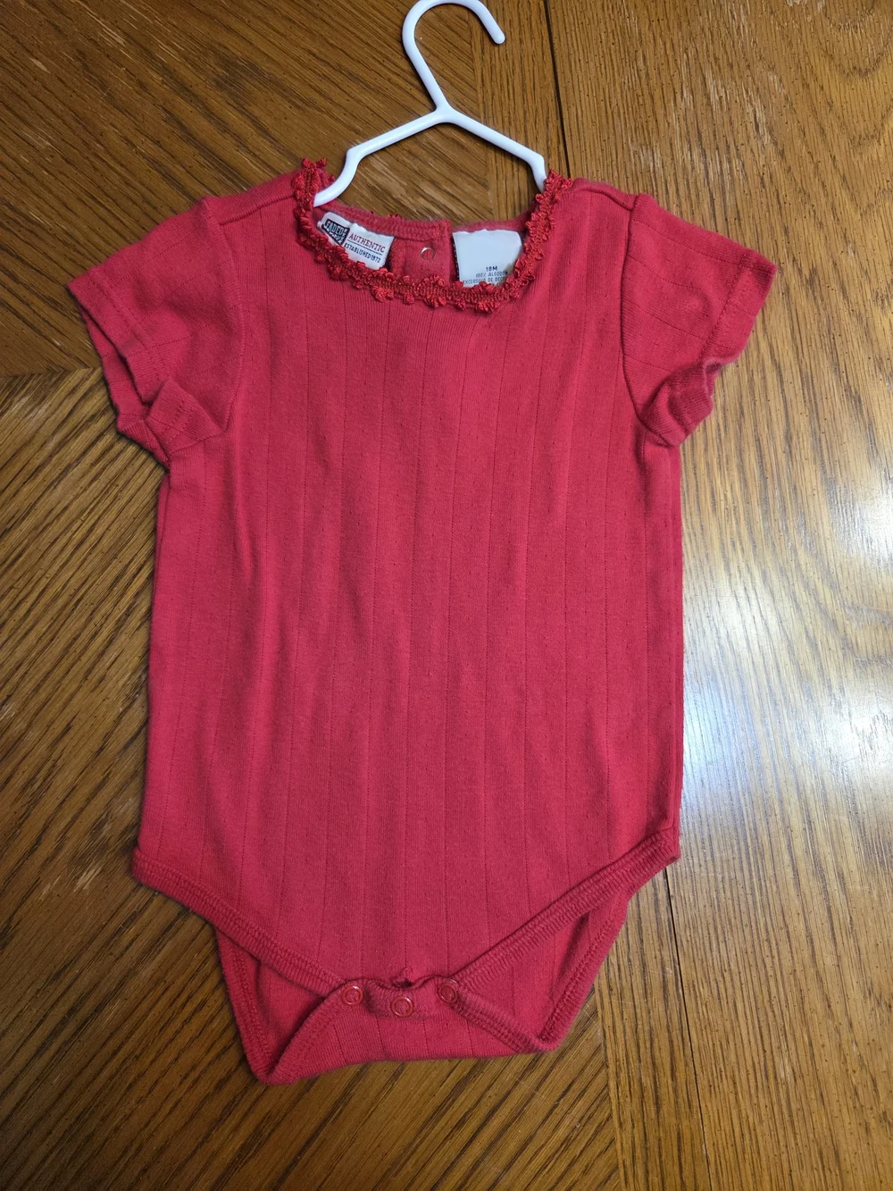 Red Ribbed Baby One-Piece Bodysuit with Decorative Neckline